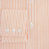 View 4 of product The Turnbull & Asser Orange Ticking Stripe Mayfair Shirt features thin vertical stripes, a classic T&A collar, and buttoned cuffs, shown on a plain white background.