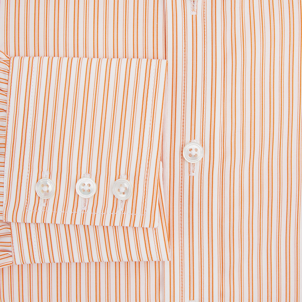 The Turnbull & Asser Orange Ticking Stripe Mayfair Shirt features thin vertical stripes, a classic T&A collar, and buttoned cuffs, shown on a plain white background.