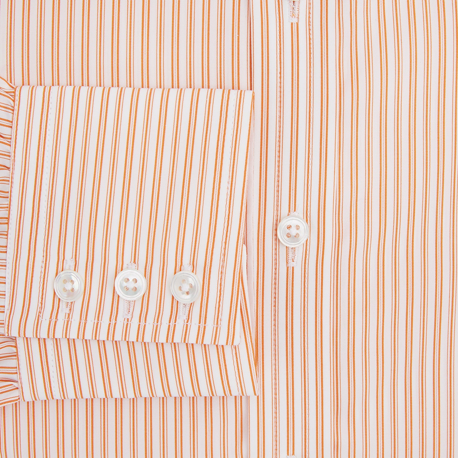 View 4 of product The Turnbull & Asser Orange Ticking Stripe Mayfair Shirt features thin vertical stripes, a classic T&A collar, and buttoned cuffs, shown on a plain white background.