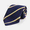 View 1 of product The Turnbull & Asser BLAZER STRIPE NAVY LEO TIE features classic navy with diagonal yellow stripes—an essential accessory to elevate any smart outfit.