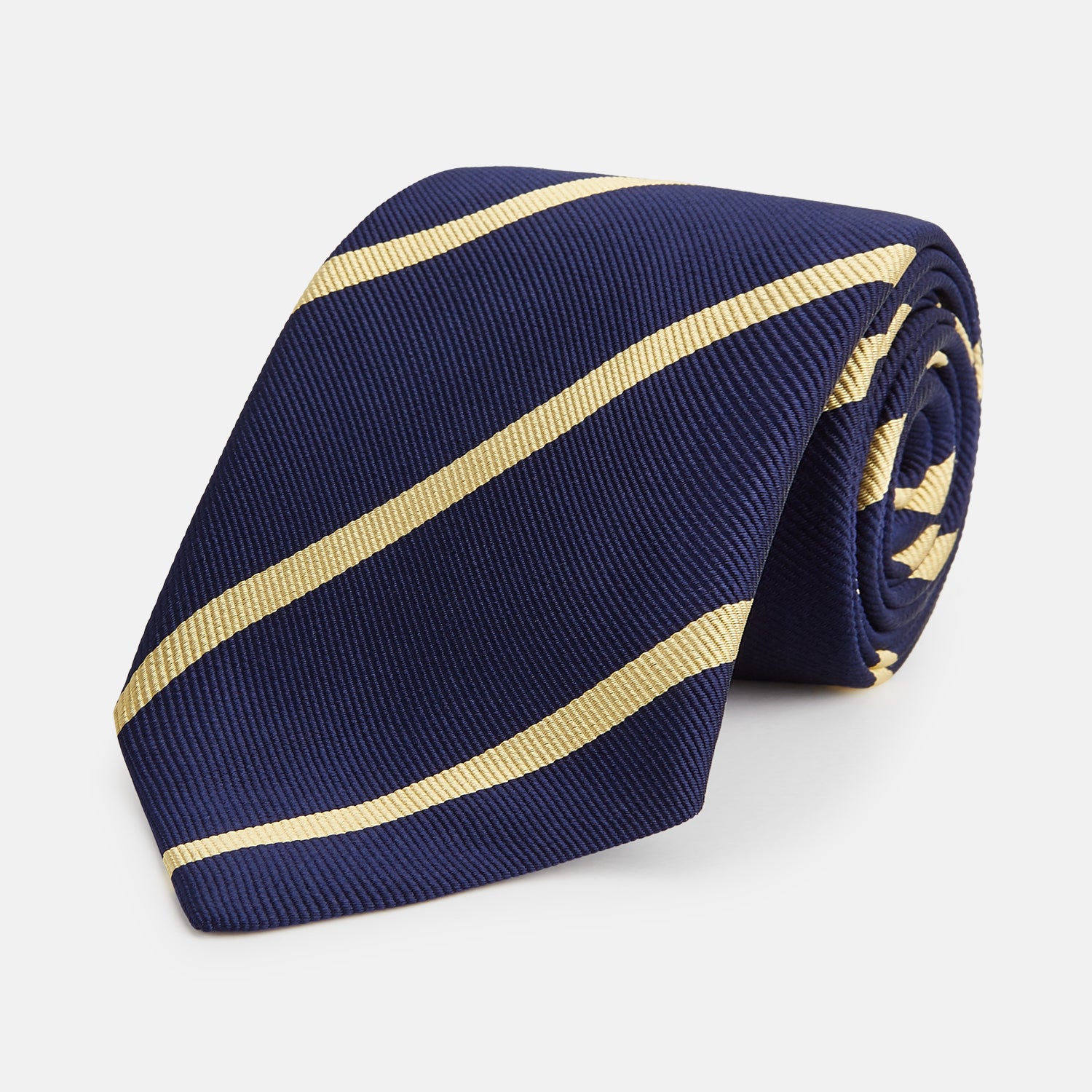 View 1 of product The Turnbull & Asser BLAZER STRIPE NAVY LEO TIE features classic navy with diagonal yellow stripes—an essential accessory to elevate any smart outfit.