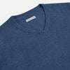 View 2 of product Turnbull & Asser’s Pacific Blue Cashmere V-Neck Jumper features ribbed cuffs, hem, and neckline, shown on a white background.