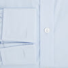 View 4 of product The Light Blue Mayfair Shirt by Turnbull & Asser is a men's cotton dress shirt featuring a pointed collar and button-down front, shown flat on a white background.