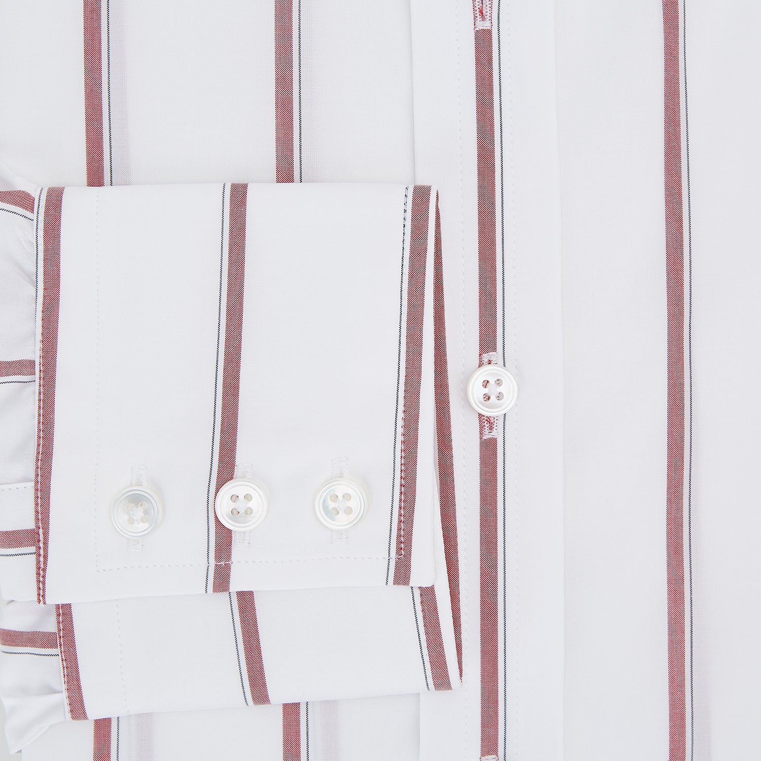 View 4 of product The Turnbull & Asser Dark Red Track Stripe Mayfair Shirt is crafted from Italian cotton, featuring a pointed collar and buttoned cuffs. Displayed against a plain light background.