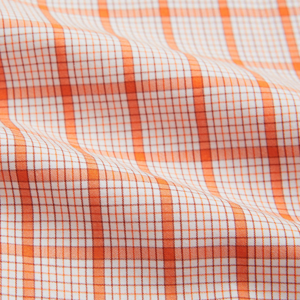 The Turnbull & Asser Orange Graph Overlay Check Mayfair Shirt is a soft organic cotton long-sleeve with button-down front, collar, and cuffs—an ideal capsule wardrobe staple—shown on a plain white background.