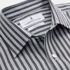 View 2 of product The Turnbull & Asser Navy Multi Stripe Weekend Fit Wool Shirt features a Derby collar, 1 button cuffs, and bold multicolored stripes, shown laid flat on a plain background.