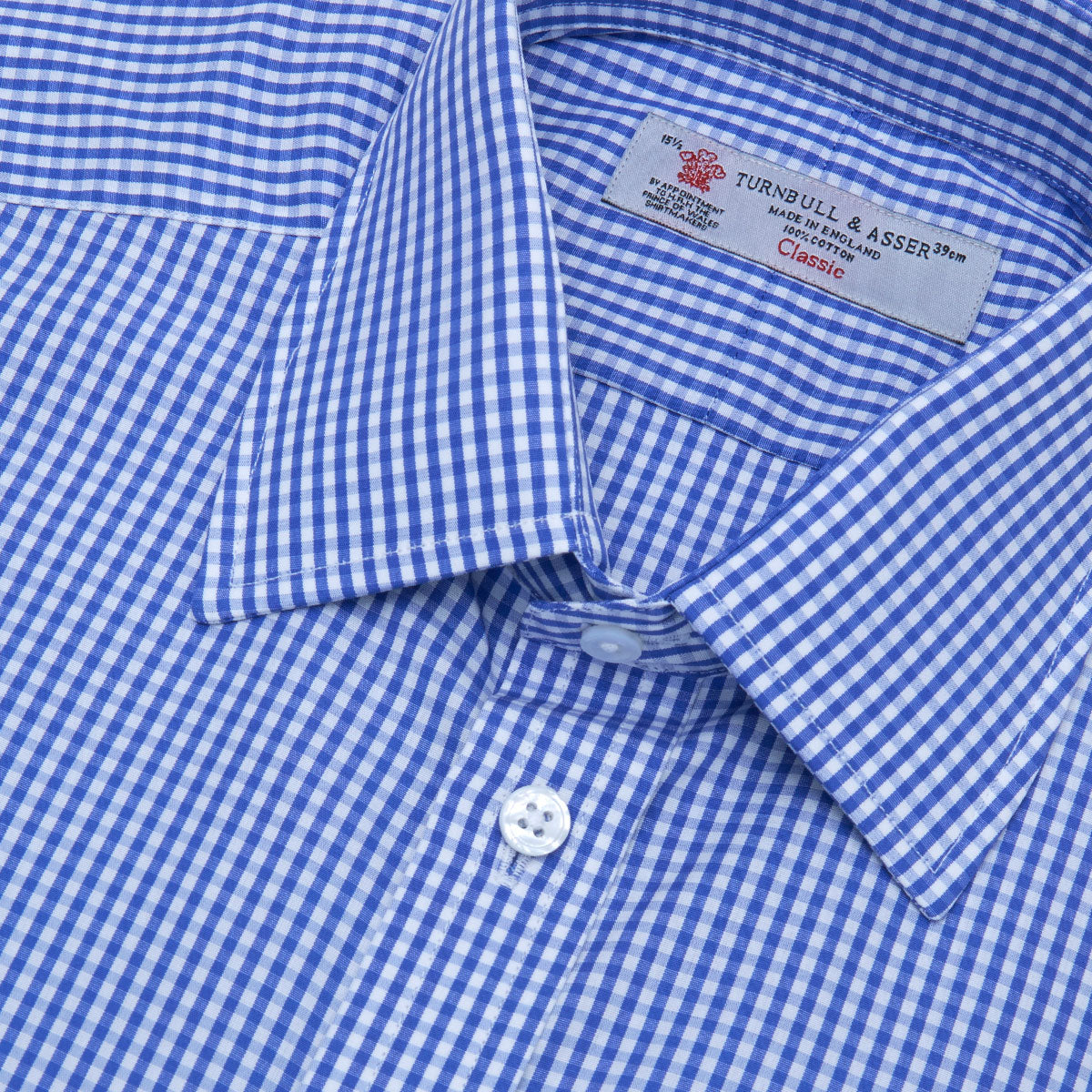 View 5 of product The Turnbull & Asser Mid-Blue Gingham Check Shirt features a T&A collar and 3-button cuffs, crafted from soft cotton and displayed against a plain white background.