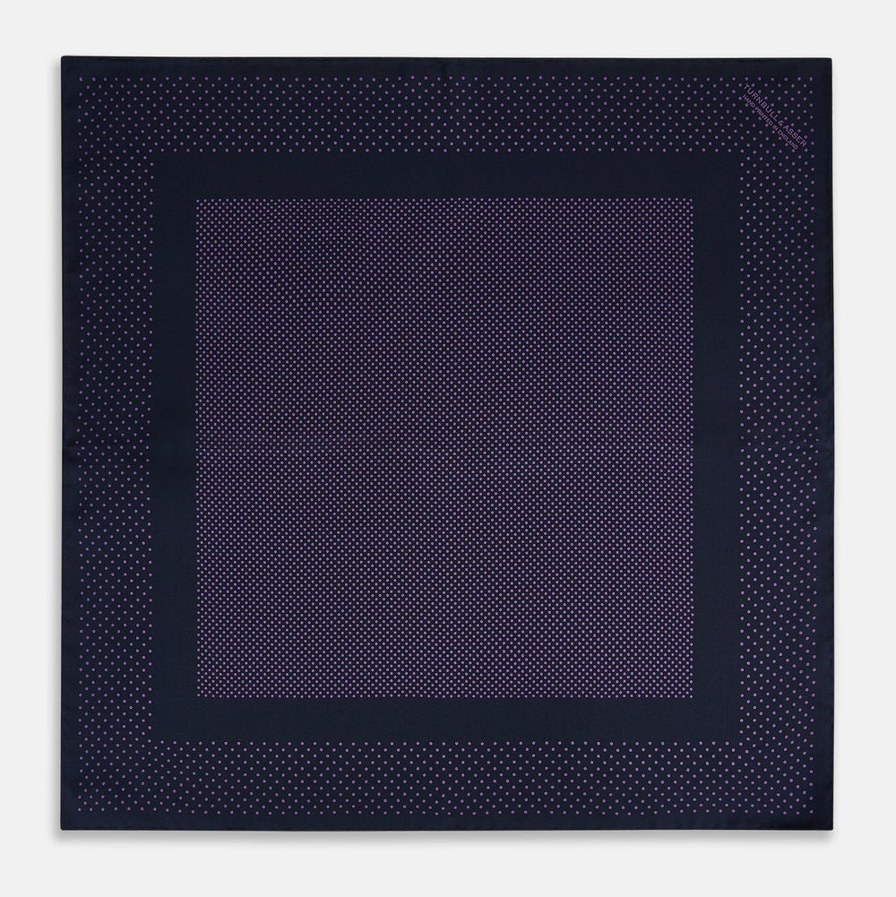 The Turnbull & Asser Navy and Purple Dot Silk Pocket Square features a stylish dot pattern—ideal for adding a refined touch to your look.