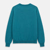 View 3 of product The Teal Glenn Crew Neck Jumper by Turnbull & Asser is shown against a white background, featuring a classic long-sleeve design with ribbed cuffs, collar, and hem.