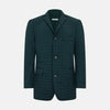 View 1 of product The Turnbull & Asser Fulham Forest Green Single-Breasted Quilted Blazer features a three-button front, notched lapels, chest pocket, and two front flap pockets—an elegant choice for the modern gentleman on a plain white background.