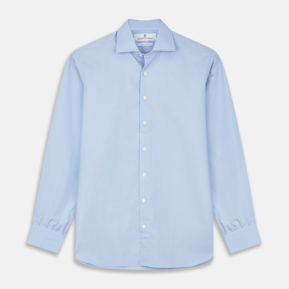 Turnbull & Asser's Tailored Fit Blue Cotton Shirt features a Kent collar, 3-button cuffs, and a clean design—ideal with a navy suit. Displayed on a plain white background.