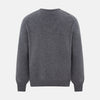 View 3 of product The Turnbull & Asser Storm Grey Cashmere V-neck Jumper features long sleeves, ribbed cuffs and hem—versatile knitwear shown on a white backdrop.