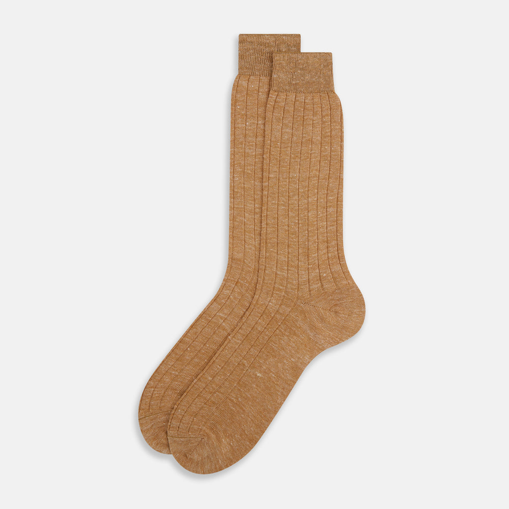 The Turnbull & Asser Rust Linen Mid-Length Sock is shown on a white background, featuring a ribbed texture for breathable comfort in everyday wear.