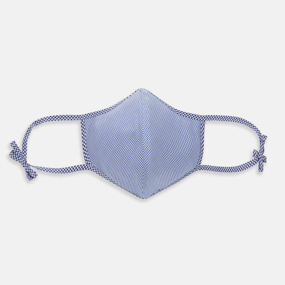 The Turnbull & Asser White & Navy Multi Check Commuter Mask comes with 3 Viroformula™ filters and two adjustable tie straps on each side, shown on a plain white background.