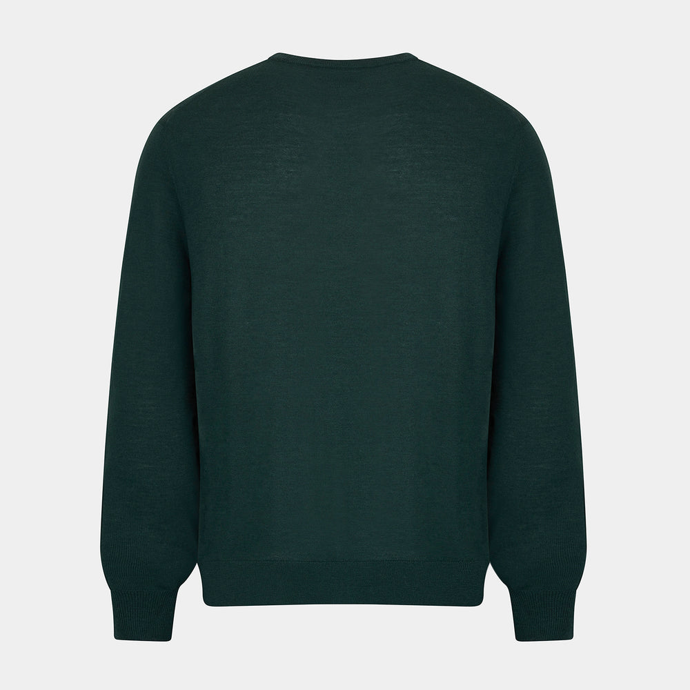 The Turnbull & Asser Forest Green Fine Merino Round Neck Jumper for men is shown on a light gray background. This knitwear features a classic design with ribbed cuffs, hem, and neckline.
