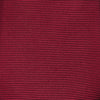 View 3 of product The HORIZONTAL TWILL BURGUNDY TIE by Turnbull & Asser features a subtle textured pattern in solid burgundy, rolled neatly and displayed against a white background—a versatile addition to any gentleman’s wardrobe.