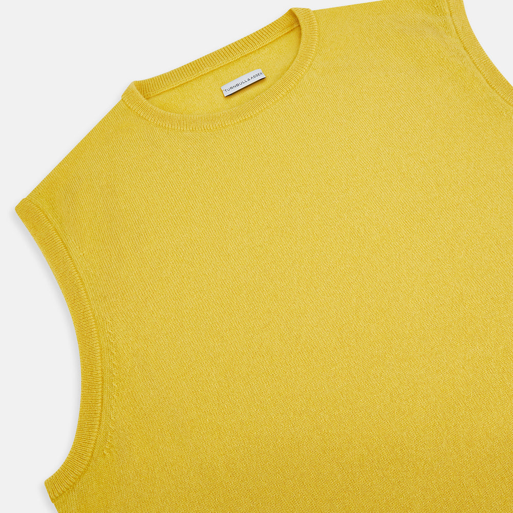 The Turnbull & Asser Canary Yellow Cashmere Round Neck Vest is a sleeveless jumper featuring ribbed collar, hem, and armholes, shown against a plain white background.