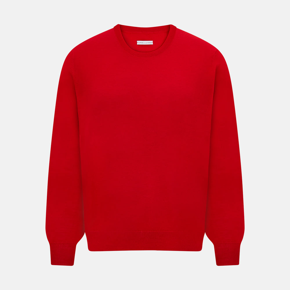 The Turnbull & Asser Red Merino Round Neck Jumper features long sleeves, ribbed cuffs and hem—a classic men's knitwear essential shown on a white background.