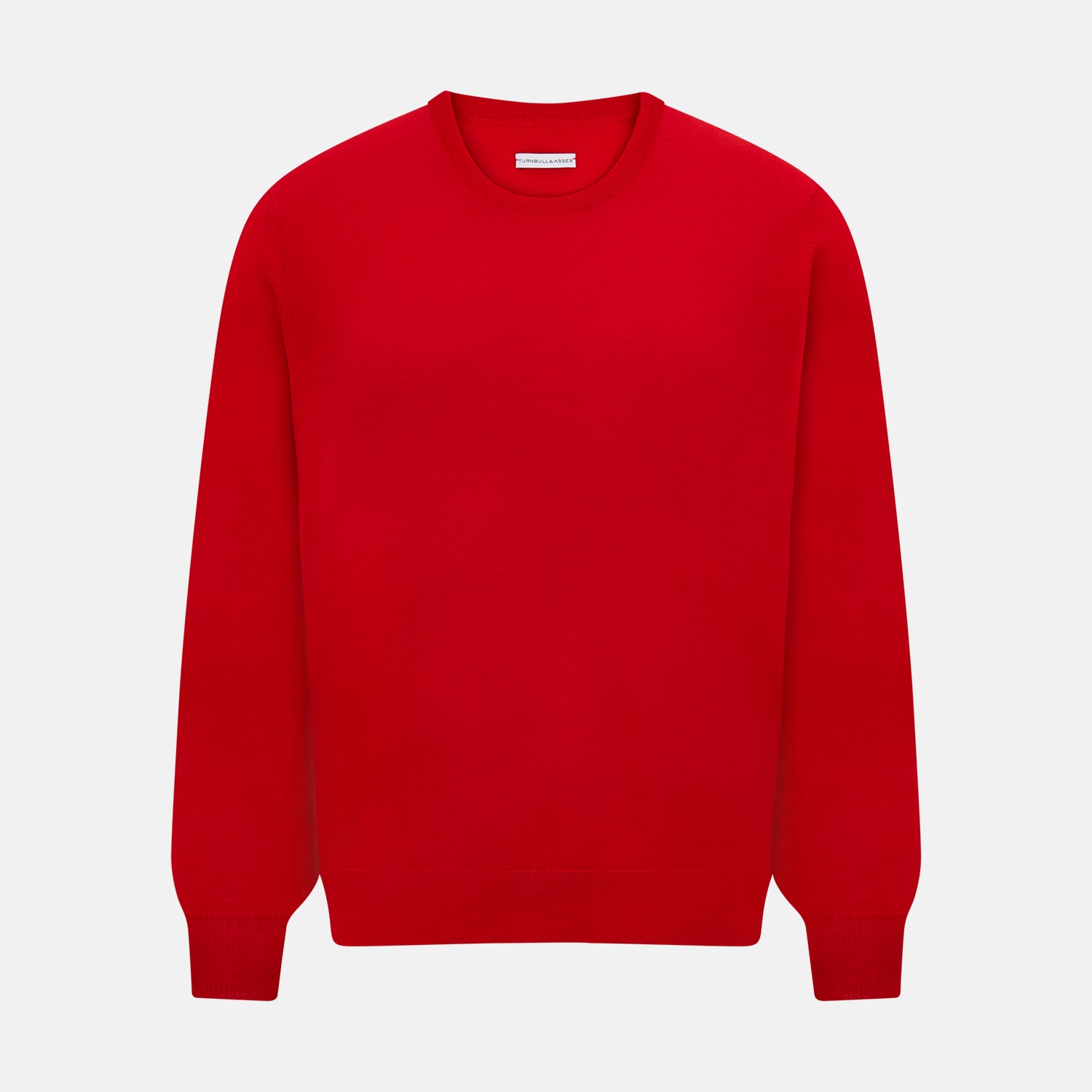 View 1 of product The Turnbull & Asser Red Merino Round Neck Jumper features long sleeves, ribbed cuffs and hem—a classic men's knitwear essential shown on a white background.