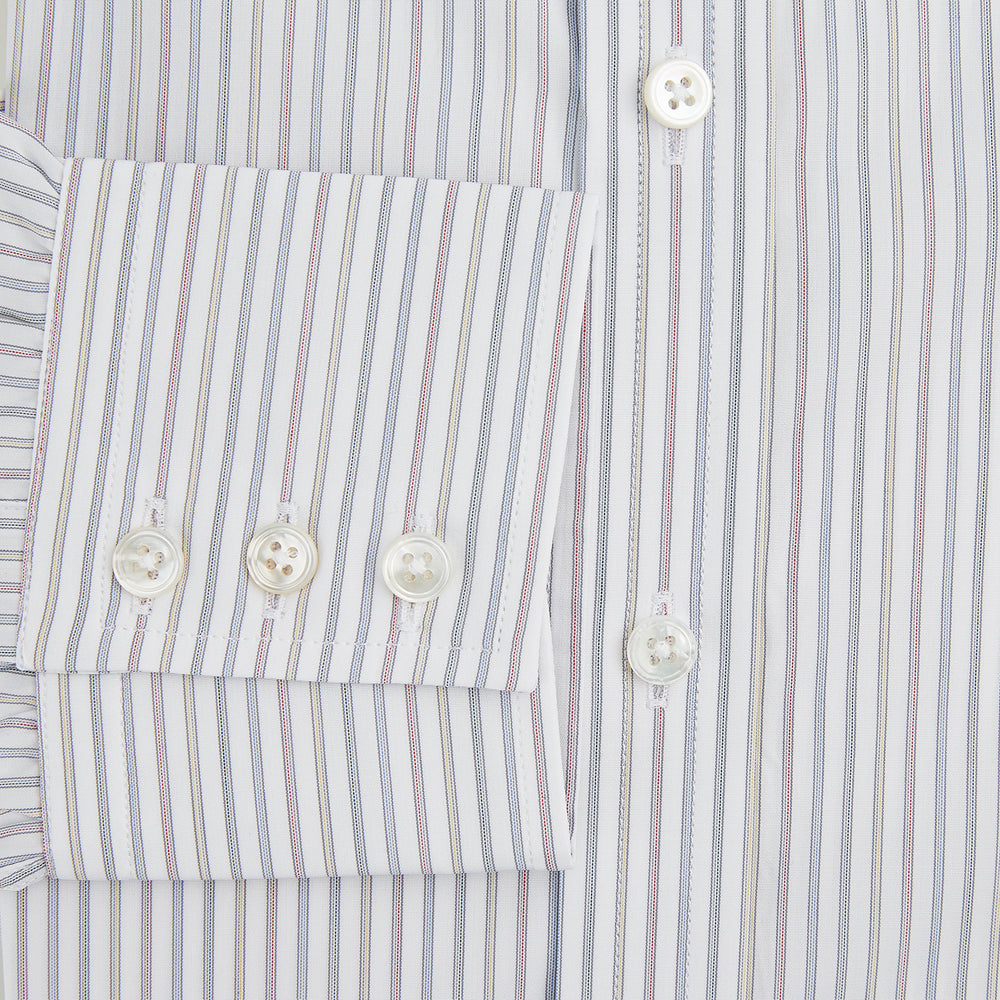 The Turnbull & Asser Multicoloured Music Stripe Mayfair Shirt features thin blue and white vertical stripes, a classic T&A collar, and buttoned cuffs, shown laid flat on a white background.