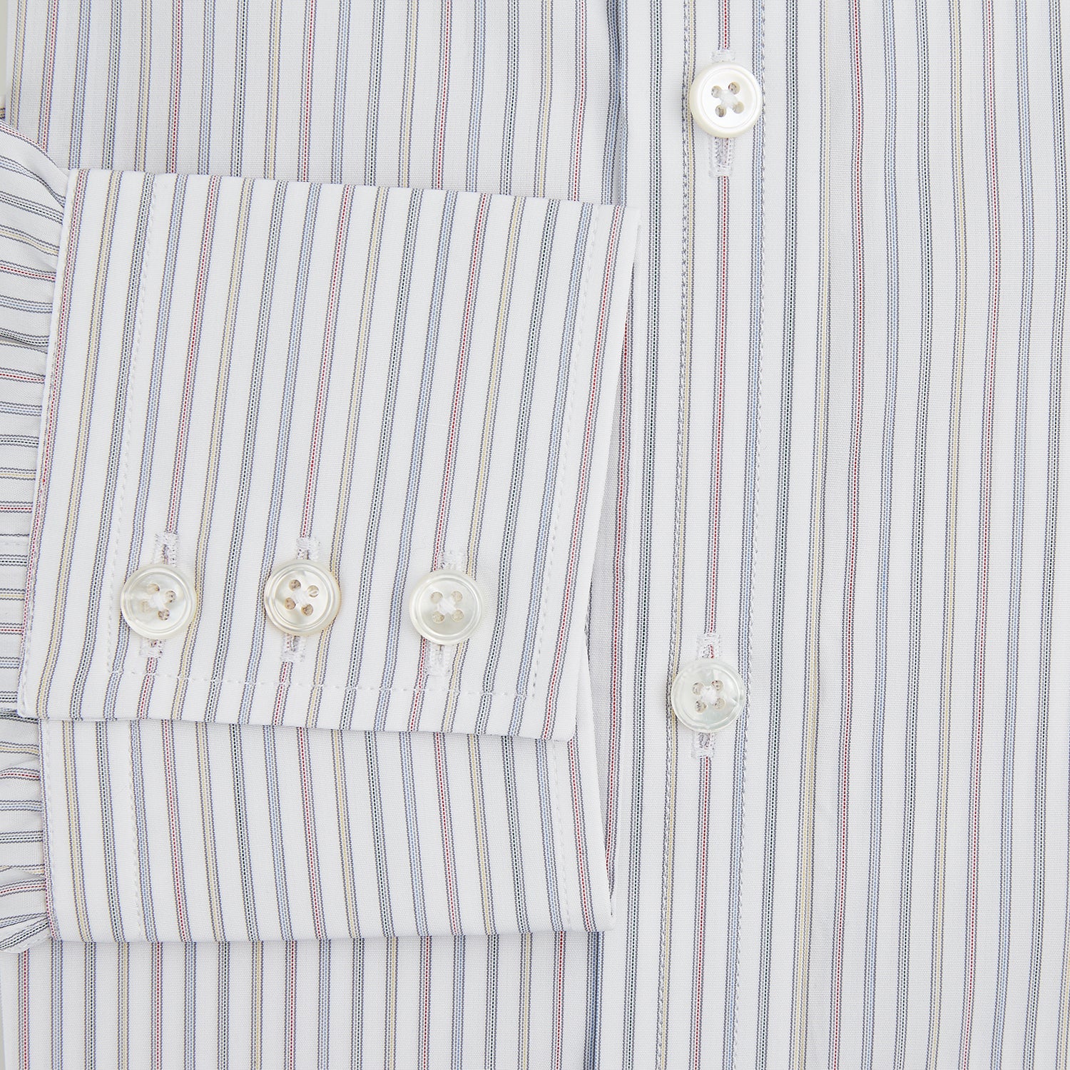 View 4 of product The Turnbull & Asser Multicoloured Music Stripe Mayfair Shirt features thin blue and white vertical stripes, a classic T&A collar, and buttoned cuffs, shown laid flat on a white background.