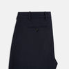 View 5 of product A pair of Navy Henry B Trousers by Turnbull & Asser, crafted from fine Italian cotton with belt loops, a flat front, and straight-leg design, displayed against a plain white background.