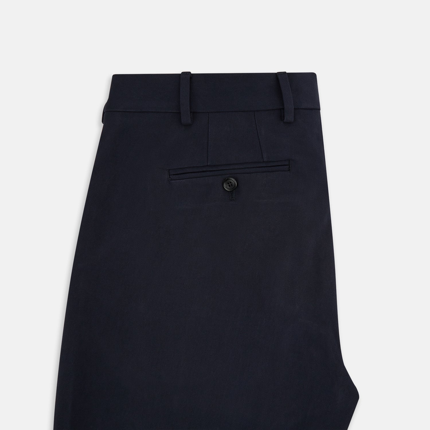 View 5 of product A pair of Navy Henry B Trousers by Turnbull & Asser, crafted from fine Italian cotton with belt loops, a flat front, and straight-leg design, displayed against a plain white background.