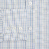 View 4 of product The Turnbull & Asser Sky Blue Combination Graph Check Mayfair Shirt features long sleeves, a pointed collar, buttoned cuffs, and a blue and white check pattern that showcases British craftsmanship. Displayed on a white background.