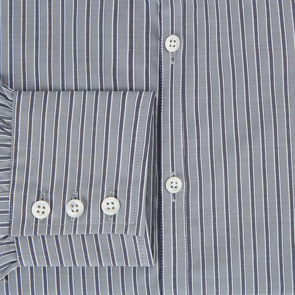 The Turnbull & Asser Grey Ticking Stripe Westminster Shirt features thin vertical grey stripes and a classic collar, showcased against a plain white background.