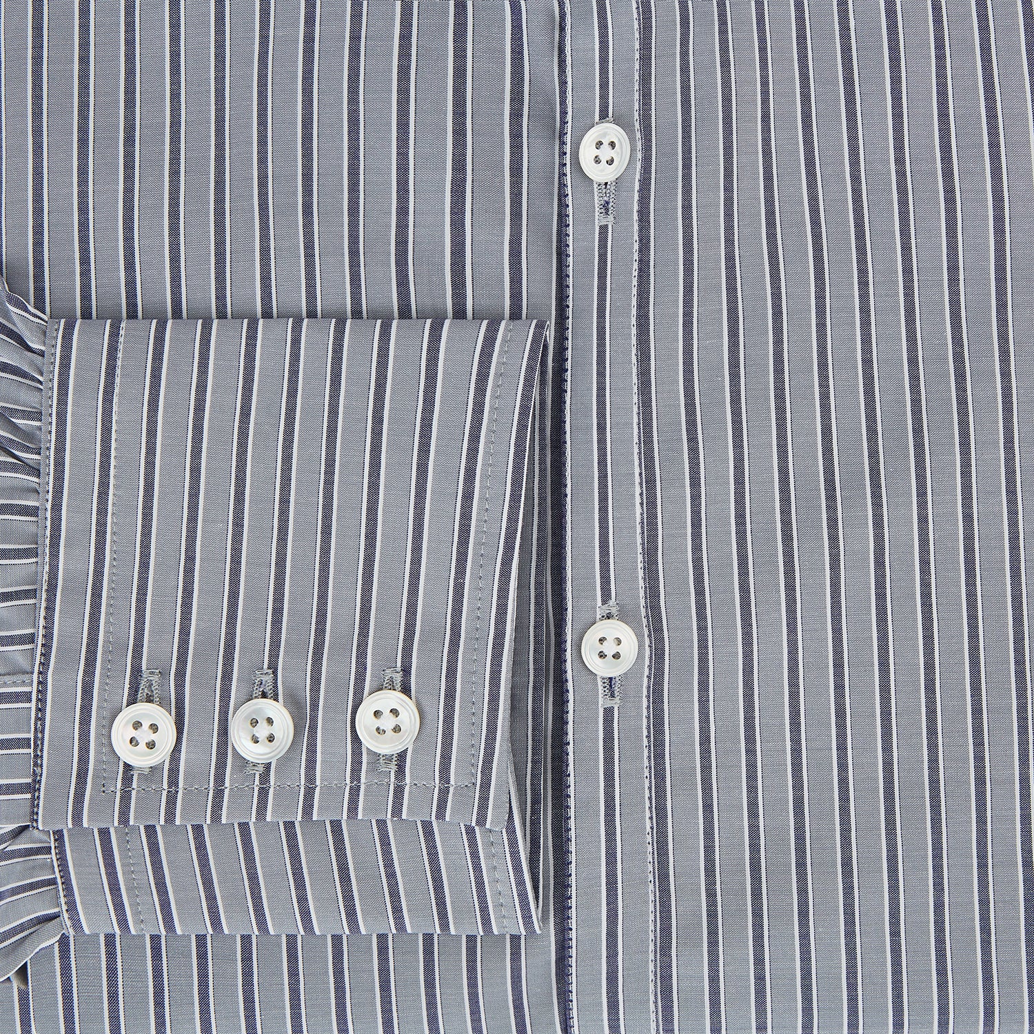 View 4 of product The Turnbull & Asser Grey Ticking Stripe Westminster Shirt features thin vertical grey stripes and a classic collar, showcased against a plain white background.