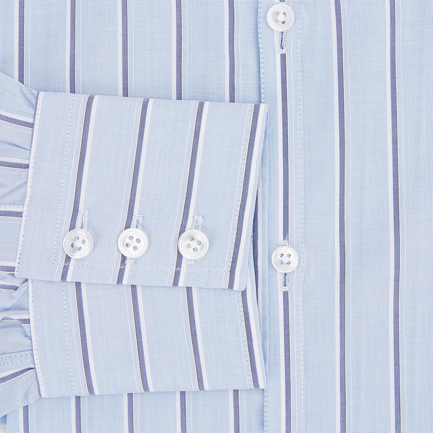 View 4 of product The Blue and Navy Multi-Stripe Westminster Shirt by Turnbull & Asser, featuring bold vertical stripes and a classic collar, exemplifies British craftsmanship and is shown laid flat on a white background.