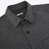 View 2 of product The Grey Highbury Overshirt by Turnbull & Asser is a long-sleeve, button-up charcoal gray overshirt with a single chest pocket, inspired by classic formal jackets and shown laid flat on a white background.