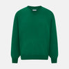 View 1 of product The Turnbull & Asser Hunter Green Fine Merino V-Neck Jumper is displayed against a white background, highlighting classic knitwear style.