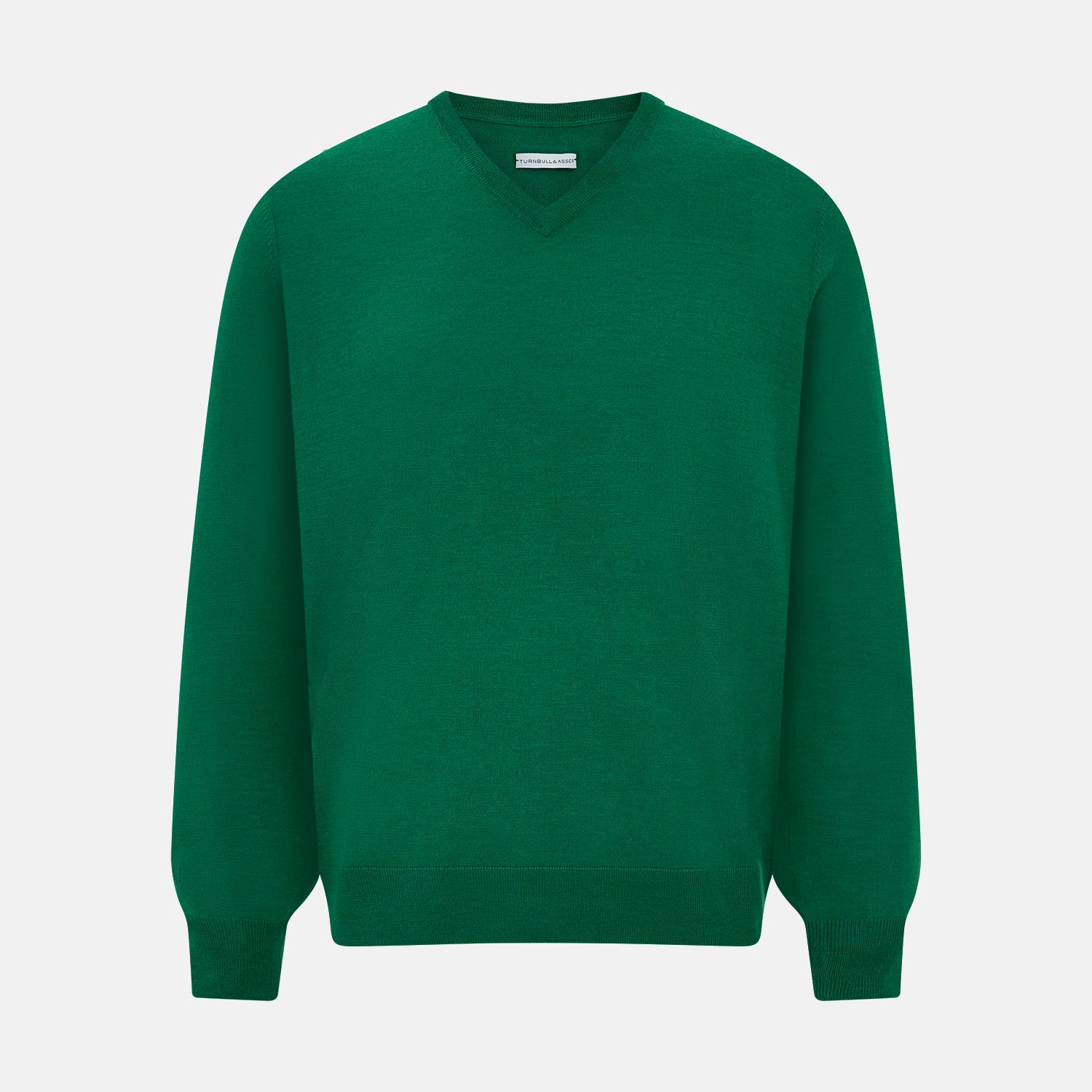 View 1 of product The Turnbull & Asser Hunter Green Fine Merino V-Neck Jumper is displayed against a white background, highlighting classic knitwear style.