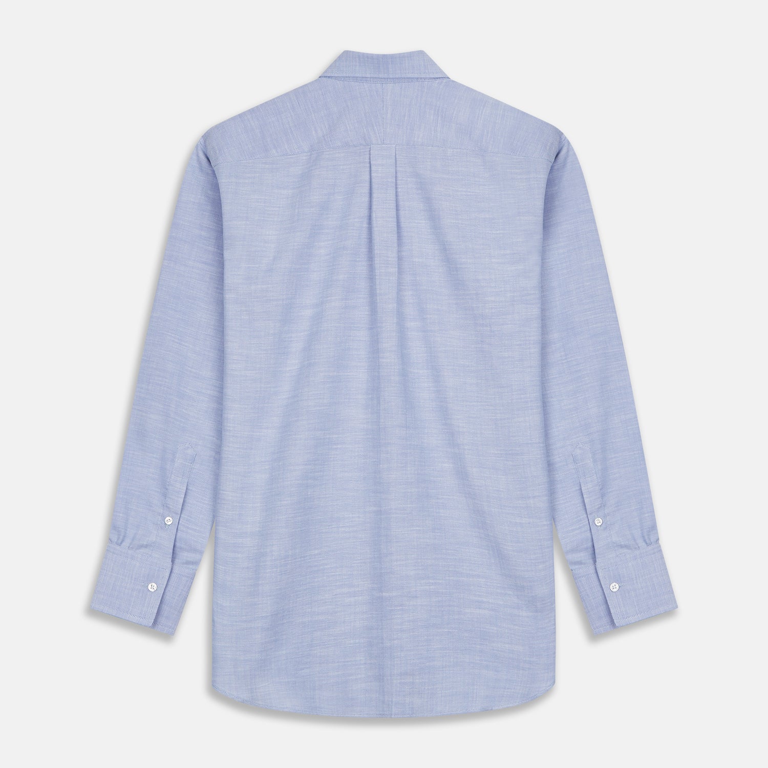 View 4 of product The Turnbull & Asser Mid-Blue Chambray Weekend Fit Shirt features a Dorset collar, white buttons, and 1-button cuffs. It is laid flat on a white background.