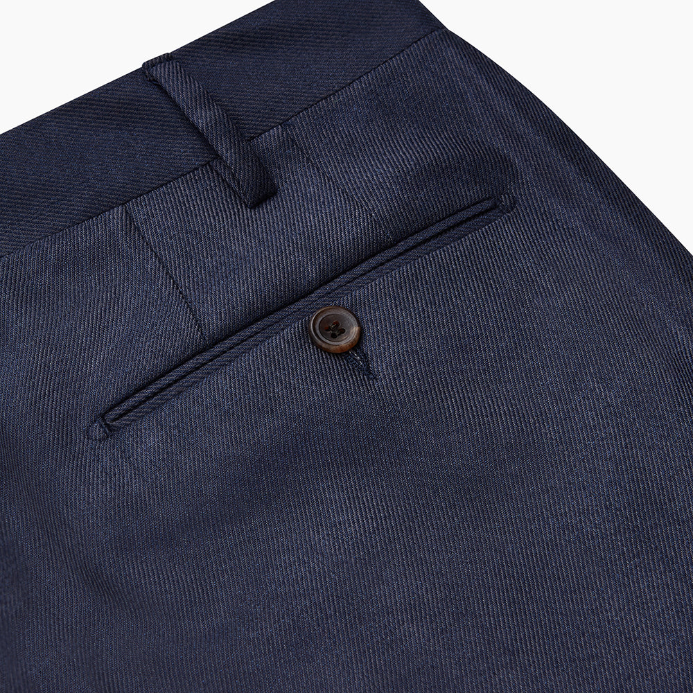 Turnbull & Asser Navy Wool Blend Single Pleated Gerry Trousers, featuring classic fit, button and zipper closure, belt loops, and straight legs, displayed flat on a white background.