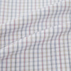 View 6 of product The Turnbull & Asser Sky Blue Multi Graph Check Shirt features long sleeves, a button-up front, pointed T&A collar, buttoned cuffs, and a small blue-and-white check pattern, shown on a white background.