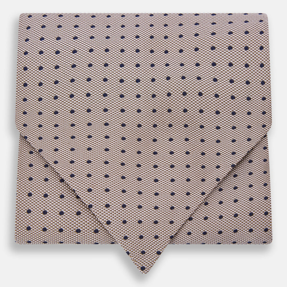 The Turnbull & Asser Navy and Lilac Micro Dot Silk Cravat features a refined pattern, making it perfect for pairing with pocket squares or to elevate any dress code with its sophisticated handmade style.