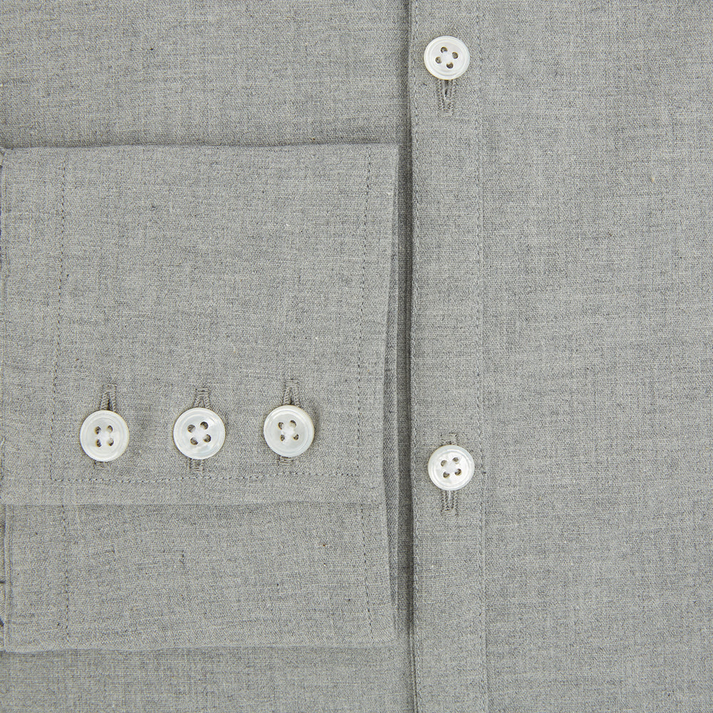 The Grey Westminster Shirt by Turnbull & Asser features a classic collar and white buttons, expertly crafted in Britain. This long-sleeve button-up is shown against a plain white background.