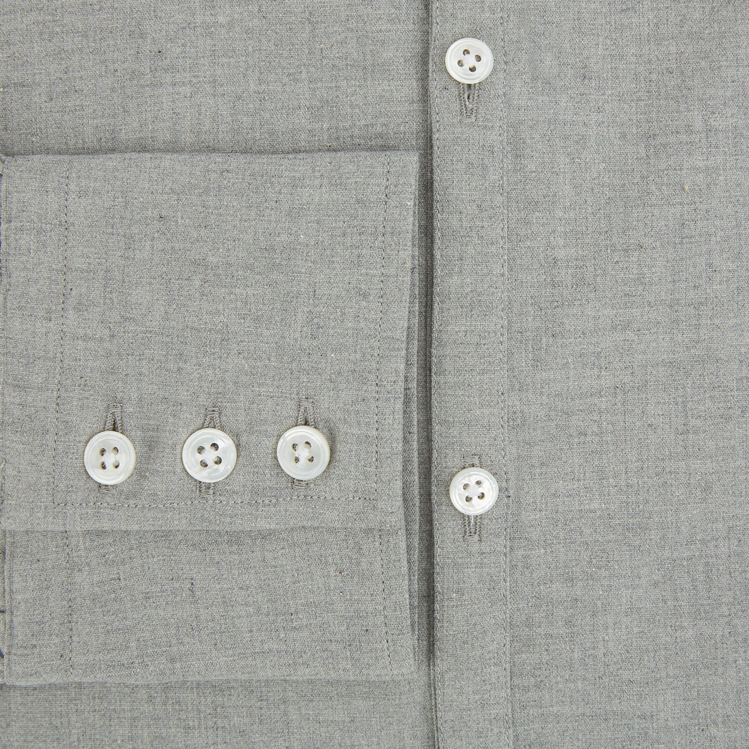 View 4 of product The Grey Westminster Shirt by Turnbull & Asser features a classic collar and white buttons, expertly crafted in Britain. This long-sleeve button-up is shown against a plain white background.