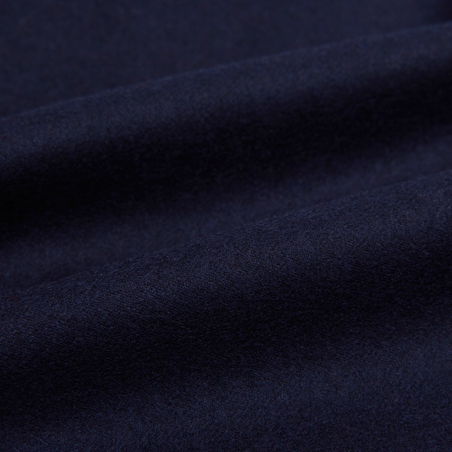 View 5 of product The Turnbull & Asser Midnight Blue Highbury Overshirt, featuring long sleeves, a collar, and a single chest pocket, is shown laid flat against a white background.