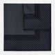 The Turnbull & Asser Navy and Grey Dot Silk Pocket Square features a neatly folded design with small grey dots on navy silk and a solid border, showcasing both sides of the luxurious fabric.