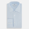 View 5 of product The Turnbull & Asser PALE BLUE COTTON REGULAR FIT MAYFAIR SHIRT is a long-sleeve, button-down shirt with a pointed T&A collar, shown laid flat on a white background.