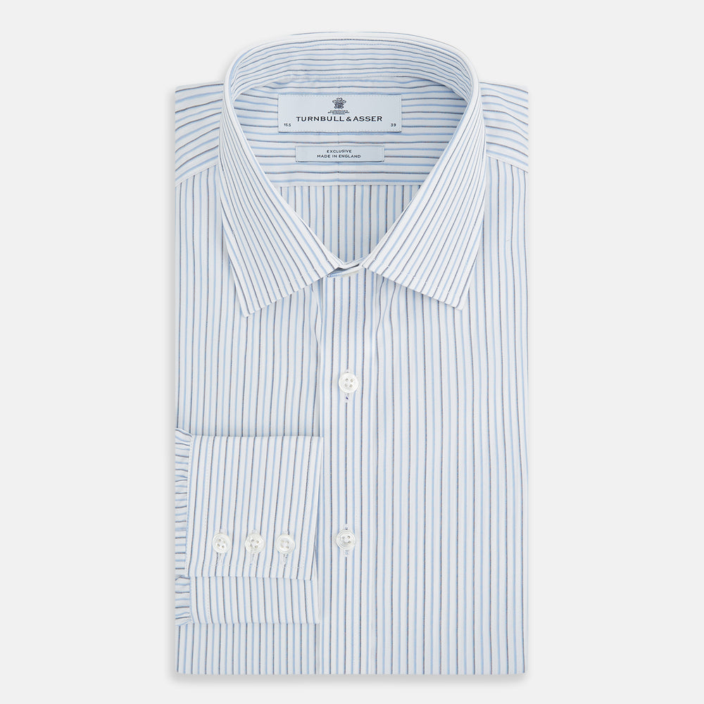 The Turnbull & Asser Navy and Blue Shadow Stripe Mayfair Shirt, featuring a classic T&A collar and buttoned cuffs, is laid flat on a white background.