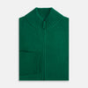 View 4 of product The Turnbull & Asser Forest Green Merino High Neck Zipped Cardigan features a ribbed collar, cuffs, and hem for classic style—this vibrant knitwear essential is shown against a white background.