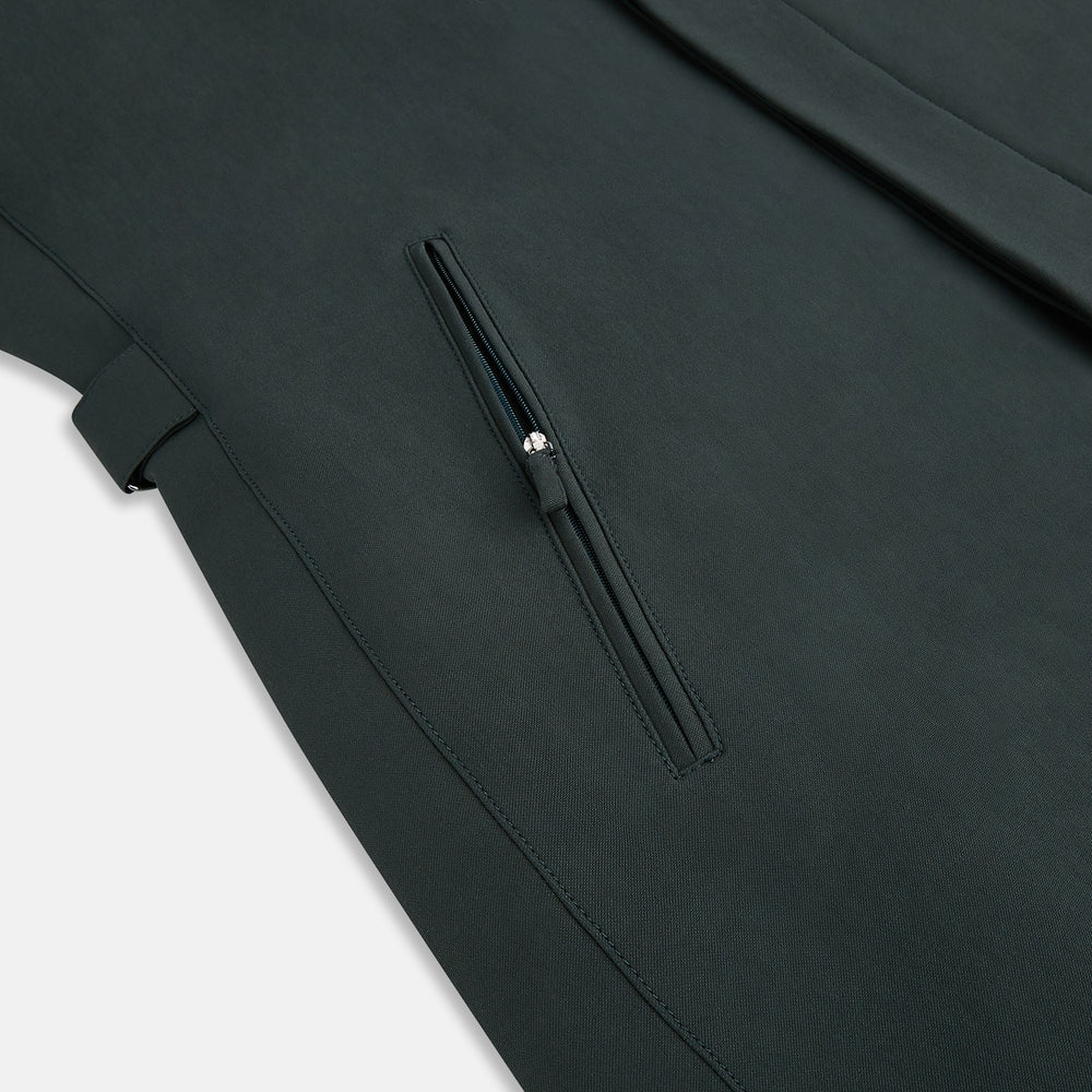 A Forest Green John Arthur Trench Coat by Turnbull & Asser, knee-length with a single-breasted button closure, three zippered pockets, and buttoned cuffs, is laid flat on a white background.