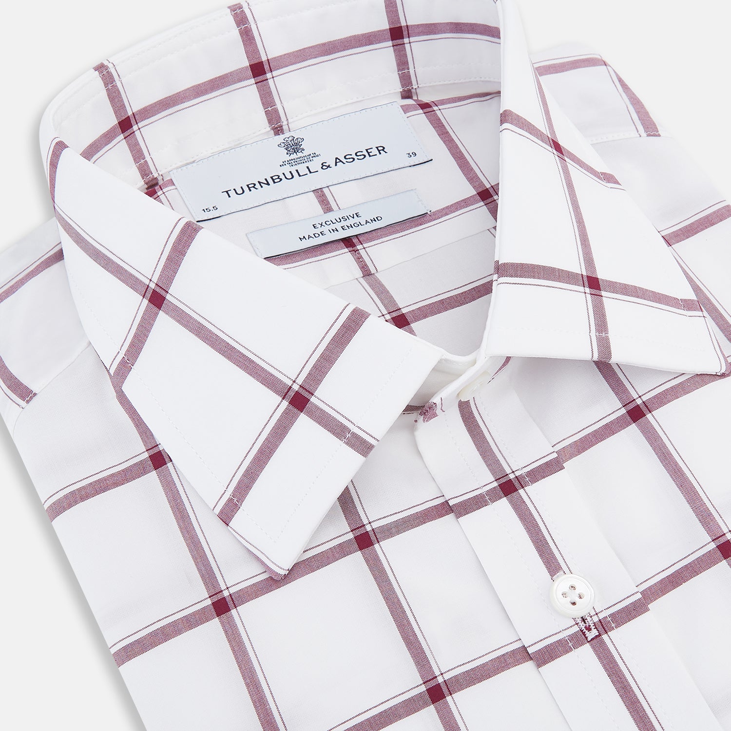 View 2 of product A long-sleeve, button-up Burgundy Grid Check Mayfair Shirt by Turnbull & Asser, made from Italian cotton with a spread collar and red grid check pattern, displayed flat on a plain white background.