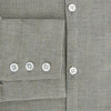 View 4 of product The Flint Grey Linen Westminster Shirt by Turnbull & Asser features long sleeves, a pointed Westminster collar, white buttons, and fine British craftsmanship, shown on a plain white background.