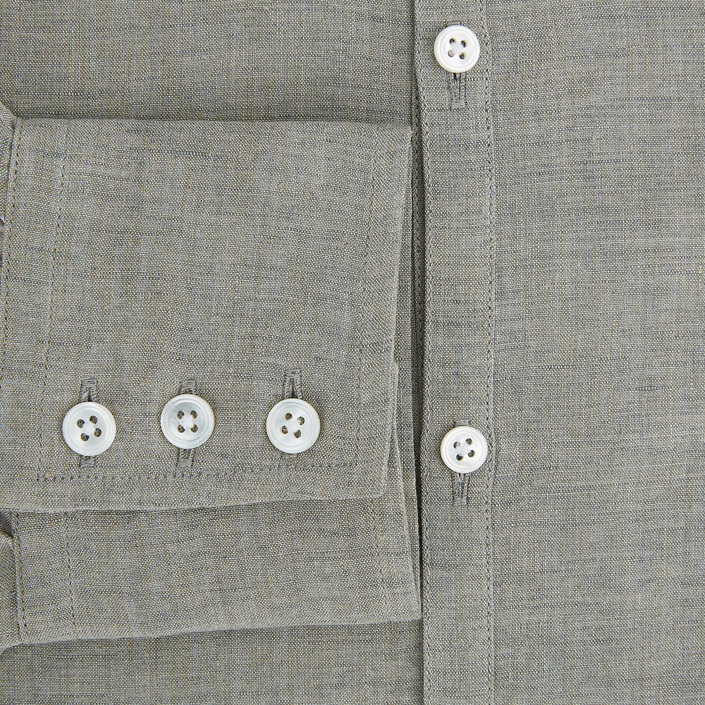 The Flint Grey Linen Westminster Shirt by Turnbull & Asser features long sleeves, a pointed Westminster collar, white buttons, and fine British craftsmanship, shown on a plain white background.