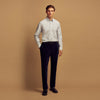 View 2 of product The Turnbull & Asser Blue Multi Stripe Wool Blend Weekend Fit Hayne Shirt features vertical blue, yellow, and white stripes, a button-down collar, and buttoned cuffs. Laid flat on a white background.